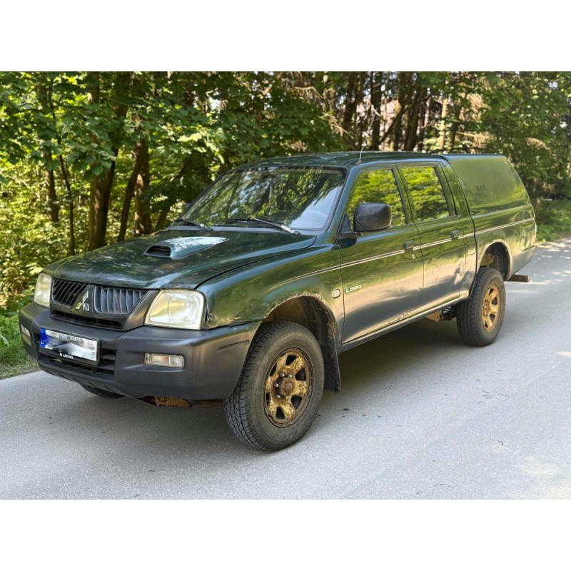 Бампер передній Mitsubishi L200 1996-2006 Polcar MR533649