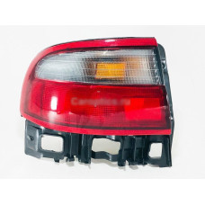 Ліхтар лівий Toyota Carina E 92-97 (Depo)