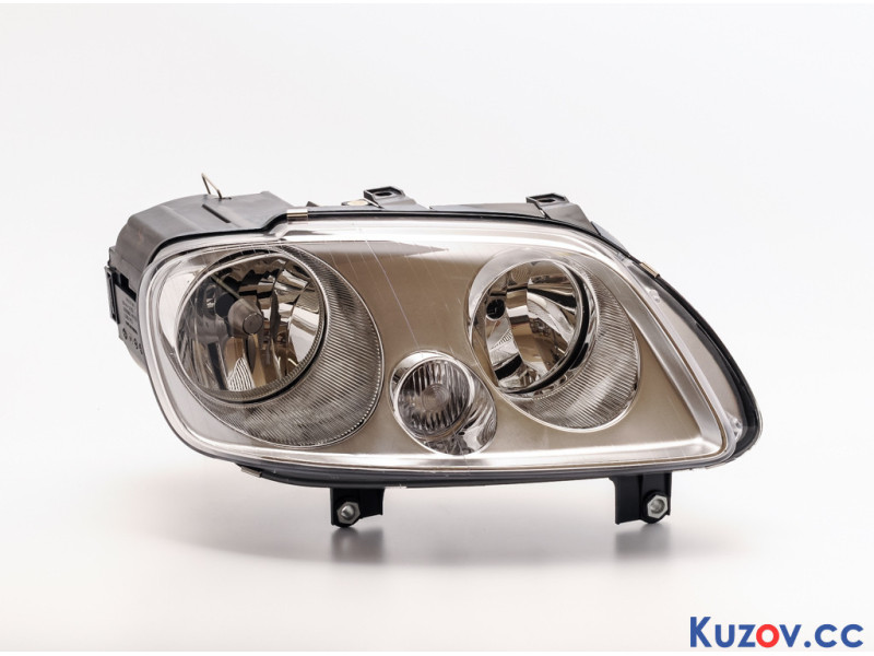 Фара ліва VW Caddy 04- (TYC)