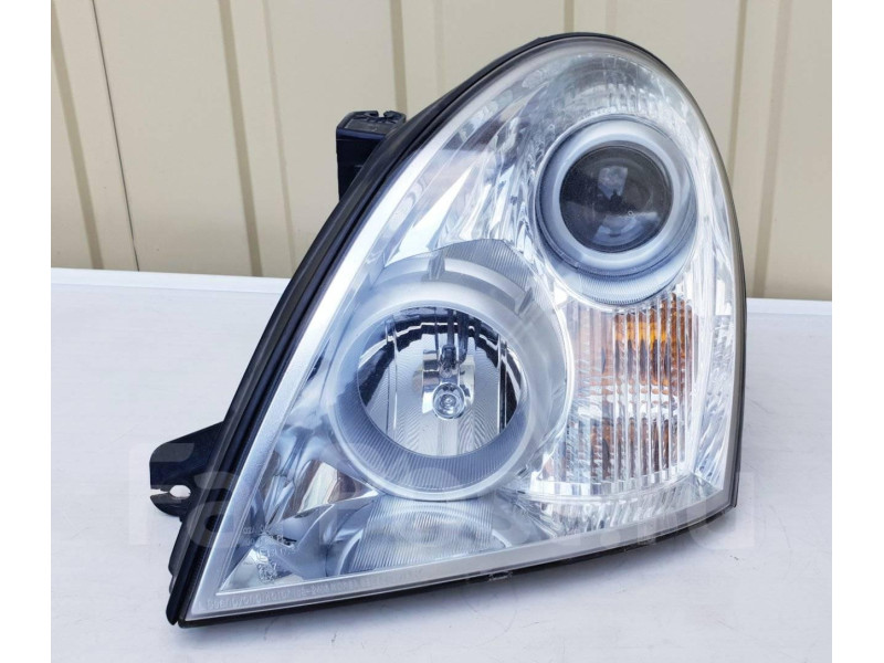 Фара ліва Rexton 06-12 (SsangYong)