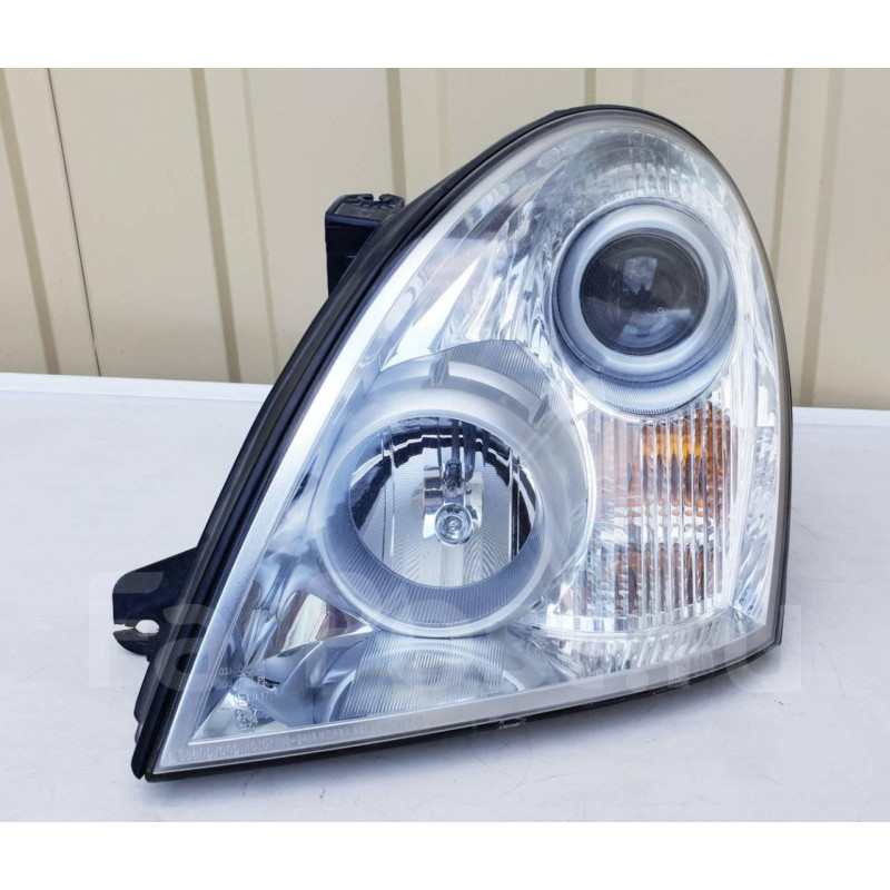 Фара ліва Rexton 06-12 (SsangYong)