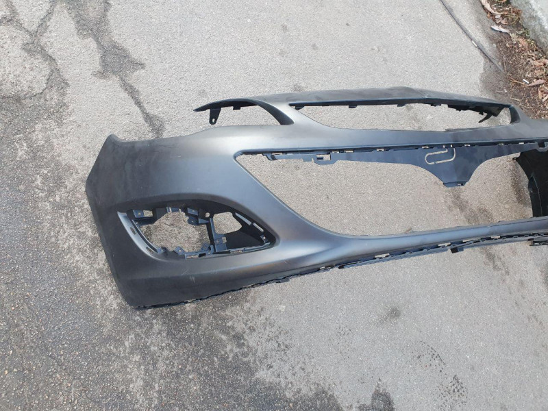 Бампер передній (без отворів під парктронік) Opel Astra J 2012- FPS 1401032