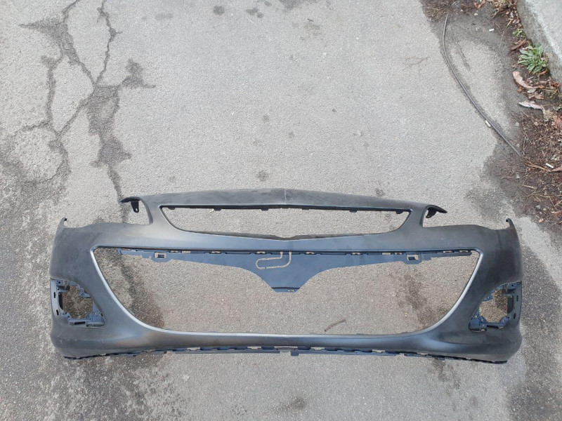 Бампер передній (без отворів під парктронік) Opel Astra J 2012- FPS 1401032