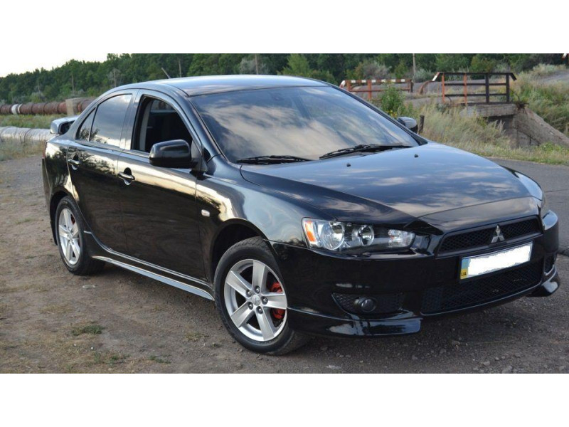 Решітка бампера середня Mitsubishi Lancer X (Tempest) 6400A827