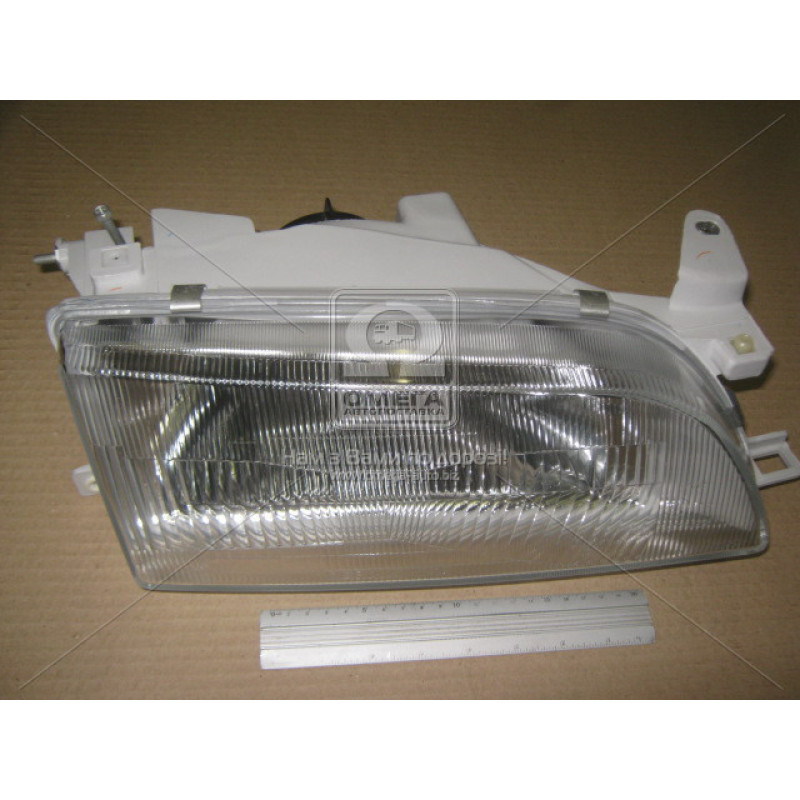 Фара передня Toyota Corolla E10 93-97 права механічна (DEPO) 811101E182