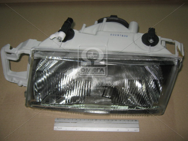 Фара передня Fiat Tempra ліва (DEPO) 7743120