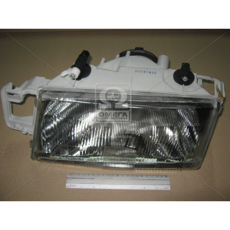 Фара передня Fiat Tempra ліва (DEPO) 7743120