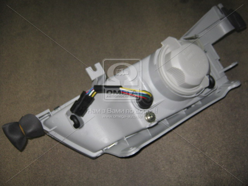 Фара передня права Daewoo Nexia N100 95-08 (Tempest) ел. корр.