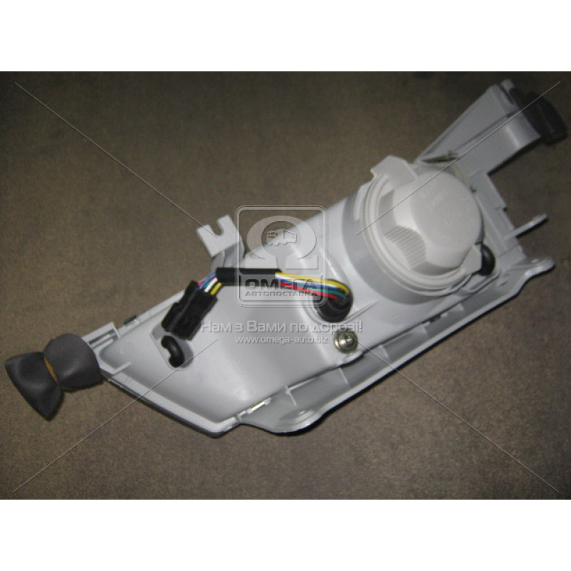 Фара передня права Daewoo Nexia N100 95-08 (Tempest) ел. корр.
