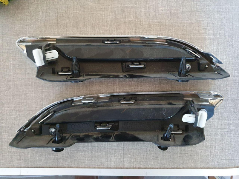 Накладка заднього бампера ліва Toyota Corolla E21 2018-2020 оригінал б/в