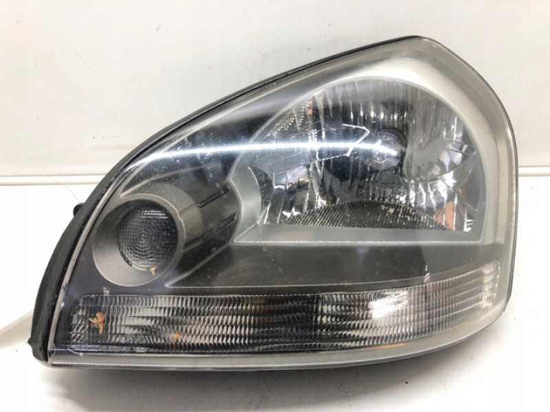 Фара передня ліва Hyundai Tucson 03-07 (FPS) мех. кор. 921012E000