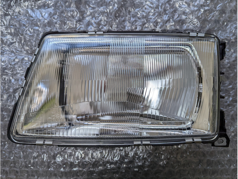 Фара ліва Audi 100 C3 82-91 (TYC) 443941029E