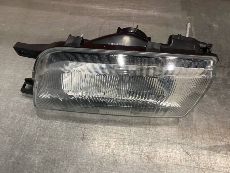Фара передня ліва Nissan Sunny N14 1991-1995 Depo мех.рег. 