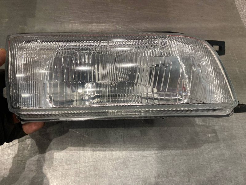 Фара передня права Nissan Sunny N14 1991-1995 Depo мех.рег. 