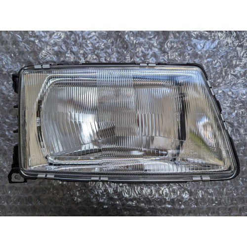 Фара передня права Audi 100 C3 82-91 TYC 443941030E