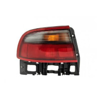 Ліхтар задній лівий зовнішній Toyota Carina E седан 92-97 (TYC) біло-червоний 815602B260