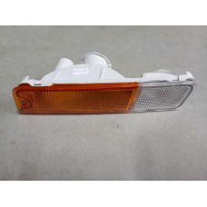 Покажчик повороту Mitsubishi L200 (96-05) лівий біло-жовтий., без патрона Depo MR109133