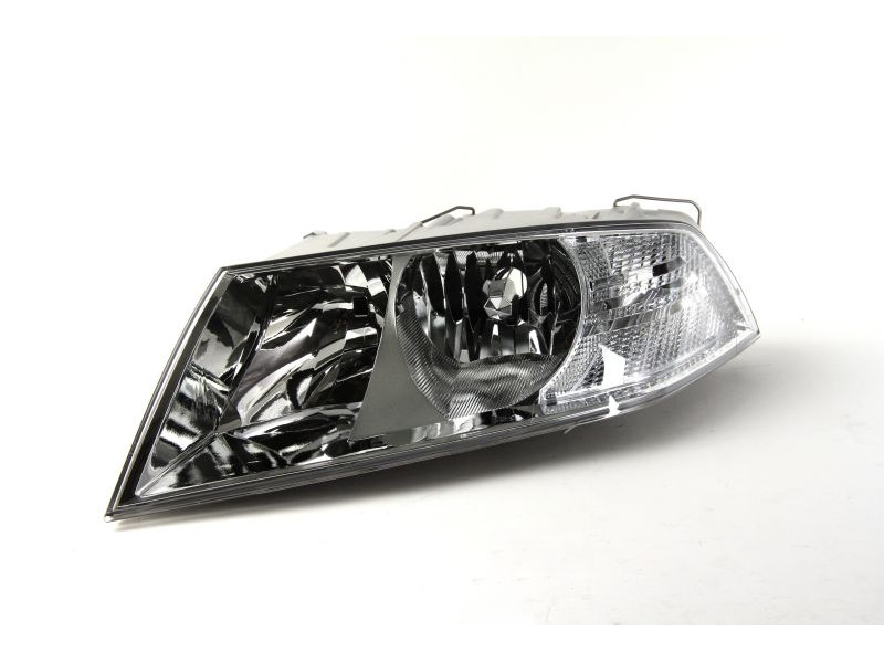 Фара передня ліва Skoda Octavia A5 05-09 (Depo) черн. нелинзованная ел. кор.1Z1941017C