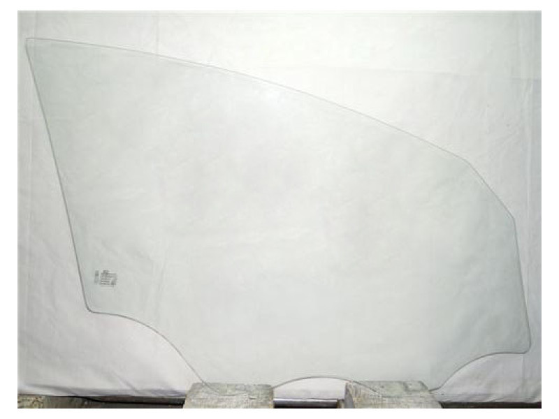 Скло дверне переднє ліве Kia Carens 13 - (XYG)