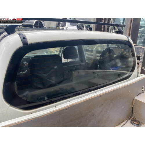 Заднє скло Mitsubishi L200 05-15 (XYG) MN117500