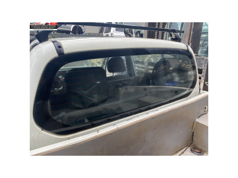Заднє скло Mitsubishi L200 05-15 (XYG) MN117500
